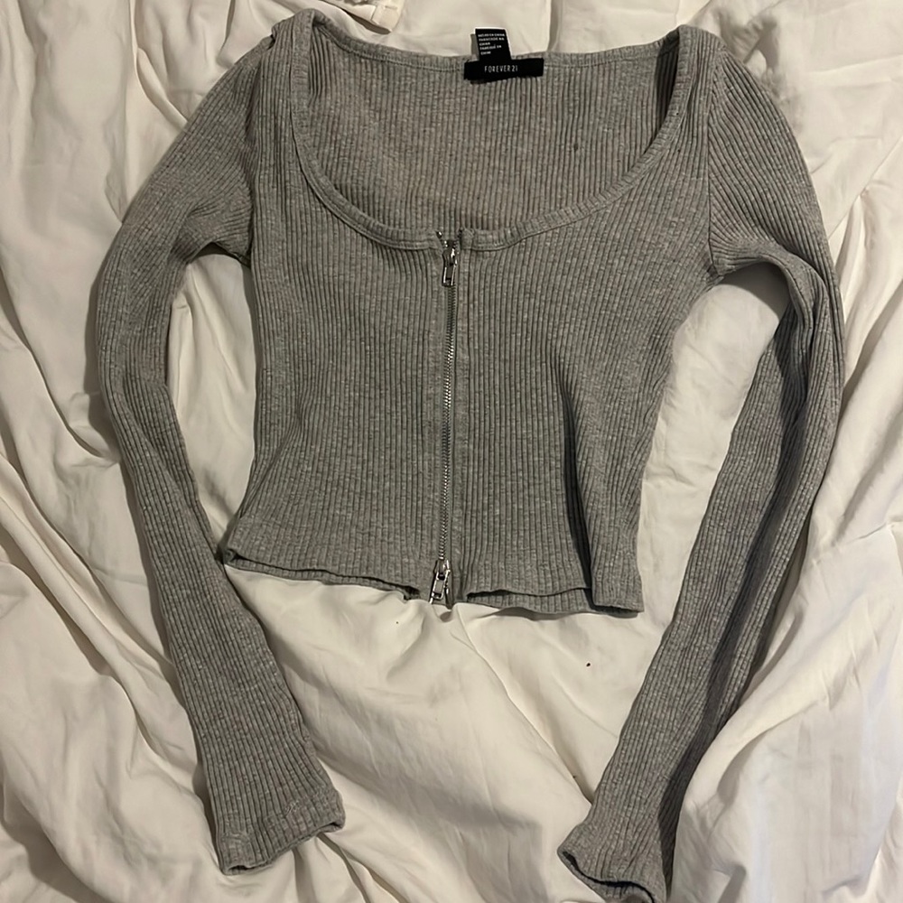 grey cropped long sleeve with zippers at top and bottom